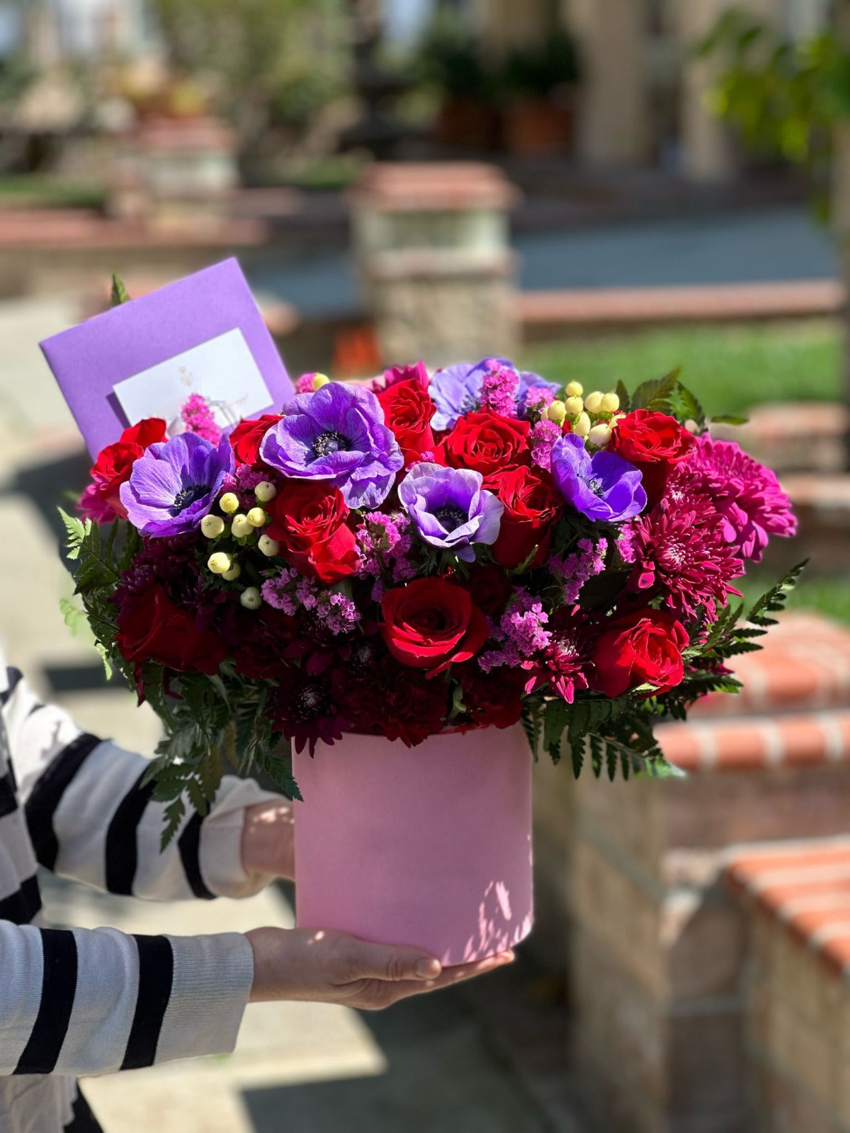 Vibrant flower box with red, purple, and hot pink seasonal blooms — perfect for birthdays and celebrations in Los Angeles