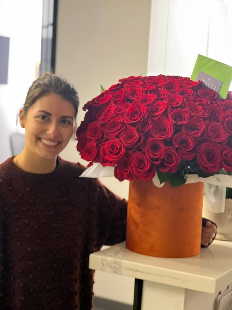 A customer receiving a Charm Flower Studio flower delivery in Los Angeles, photo 2