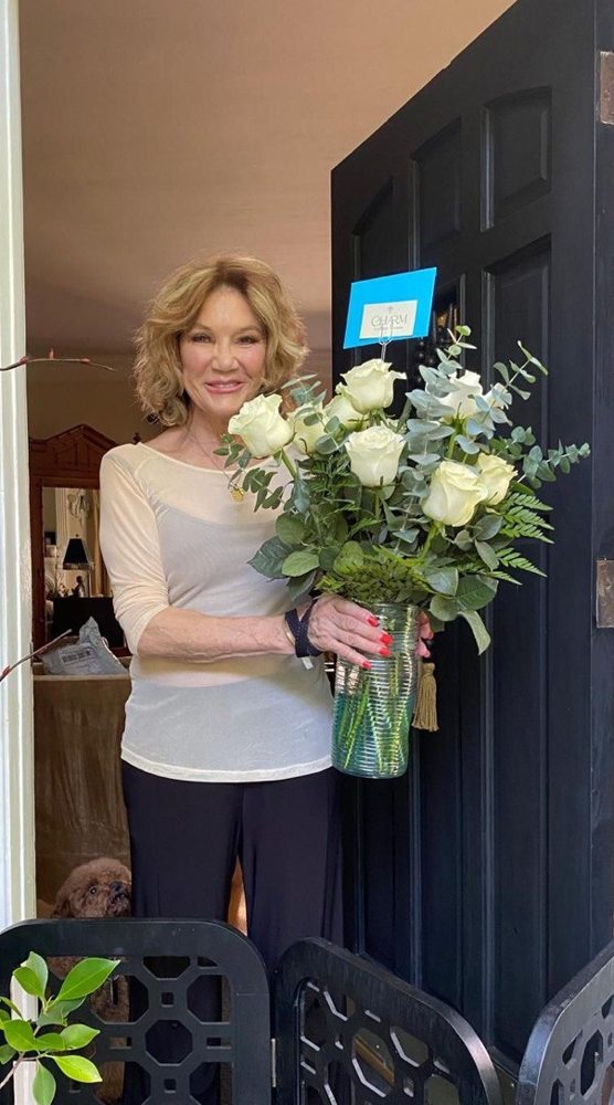 A customer receiving a Charm Flower Studio flower delivery in Los Angeles, photo 5