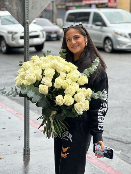 A customer receiving a Charm Flower Studio flower delivery in Los Angeles, photo 7