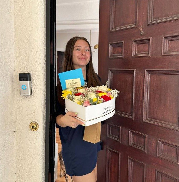 A customer receiving a Charm Flower Studio flower delivery in Los Angeles, photo 3