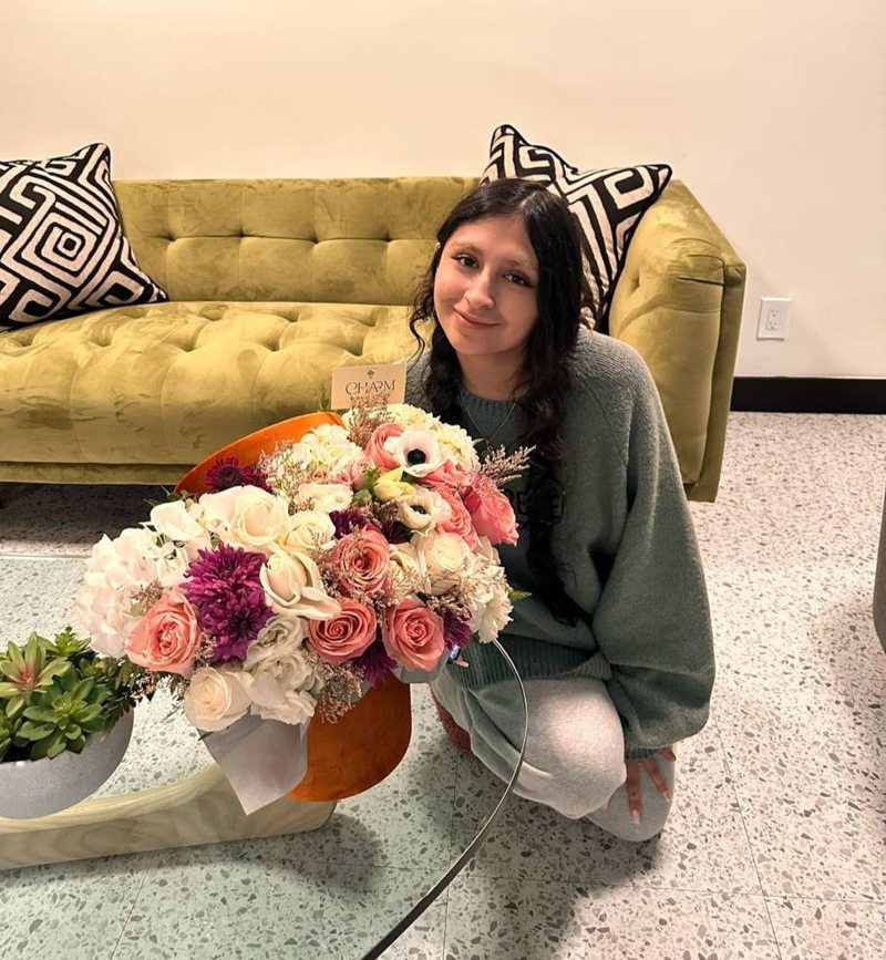 A customer receiving a Charm Flower Studio flower delivery in Los Angeles, photo 8
